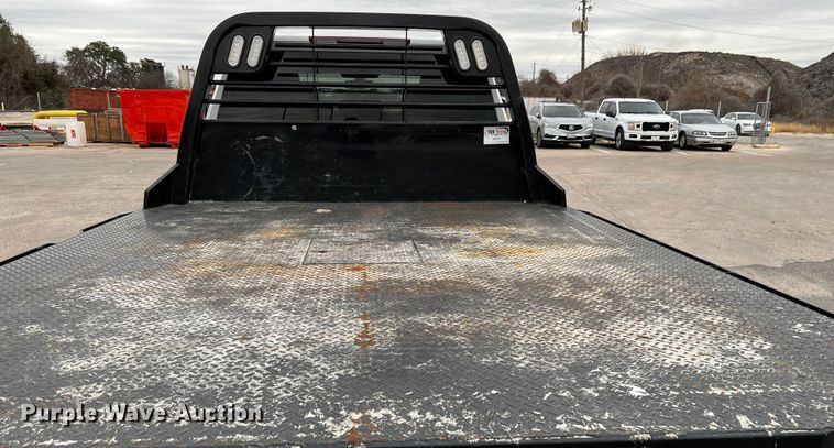 image for item DQ1953 2021 Chevrolet Silverado 3500HD  Crew Cab flatbed pickup truck