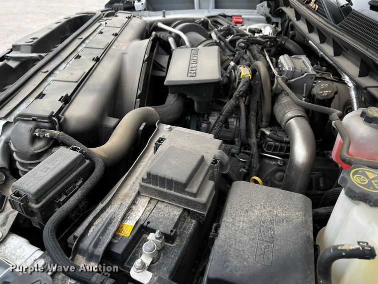 image for item DQ1953 2021 Chevrolet Silverado 3500HD  Crew Cab flatbed pickup truck