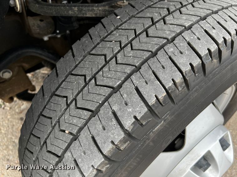 image for item DQ1953 2021 Chevrolet Silverado 3500HD  Crew Cab flatbed pickup truck