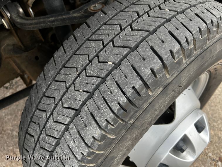 image for item DQ1953 2021 Chevrolet Silverado 3500HD  Crew Cab flatbed pickup truck