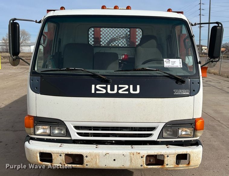 image for item DQ5119 1999 Isuzu NPR  dump flatbed truck