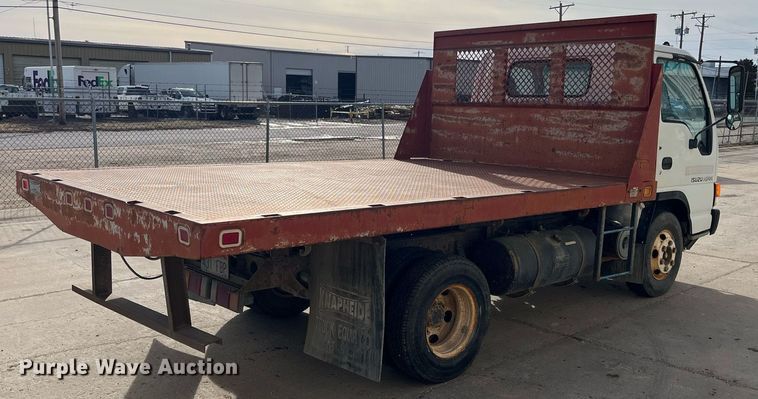 image for item DQ5119 1999 Isuzu NPR  dump flatbed truck