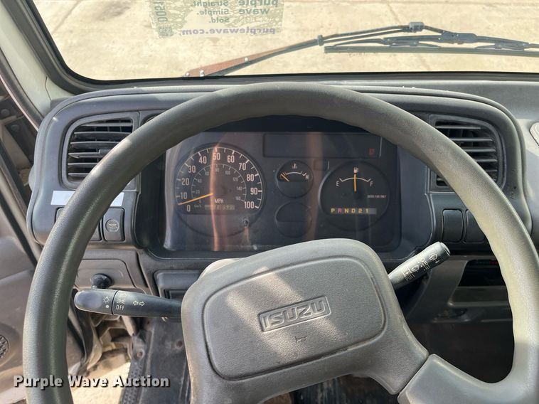 image for item DQ5119 1999 Isuzu NPR  dump flatbed truck