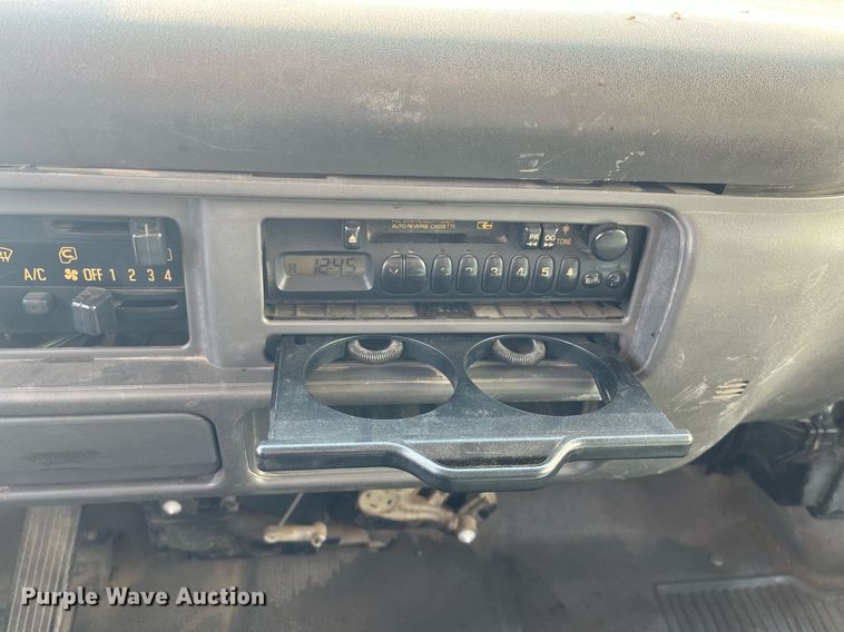 image for item DQ5119 1999 Isuzu NPR  dump flatbed truck