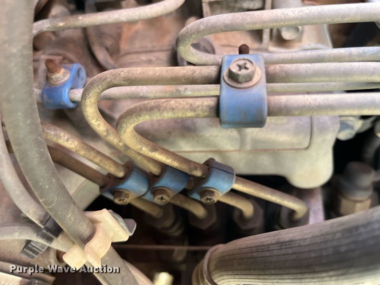 image for item DQ5119 1999 Isuzu NPR  dump flatbed truck