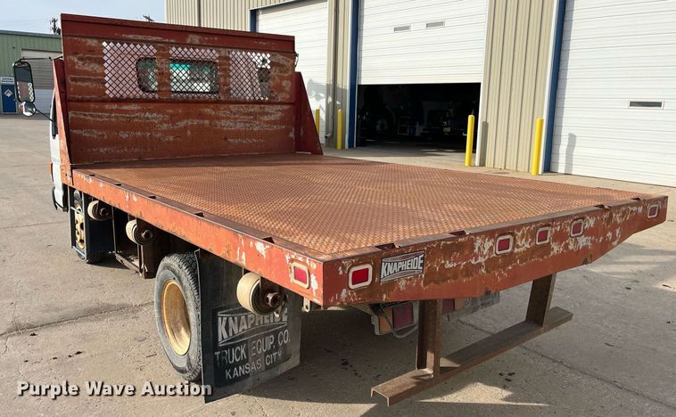 image for item DQ5119 1999 Isuzu NPR  dump flatbed truck