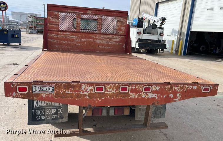 image for item DQ5119 1999 Isuzu NPR  dump flatbed truck