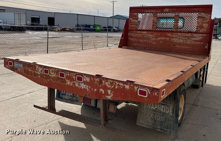 image for item DQ5119 1999 Isuzu NPR  dump flatbed truck