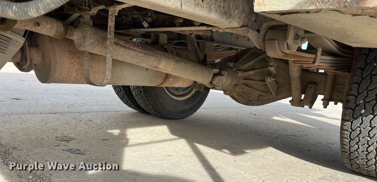 image for item DQ5119 1999 Isuzu NPR  dump flatbed truck