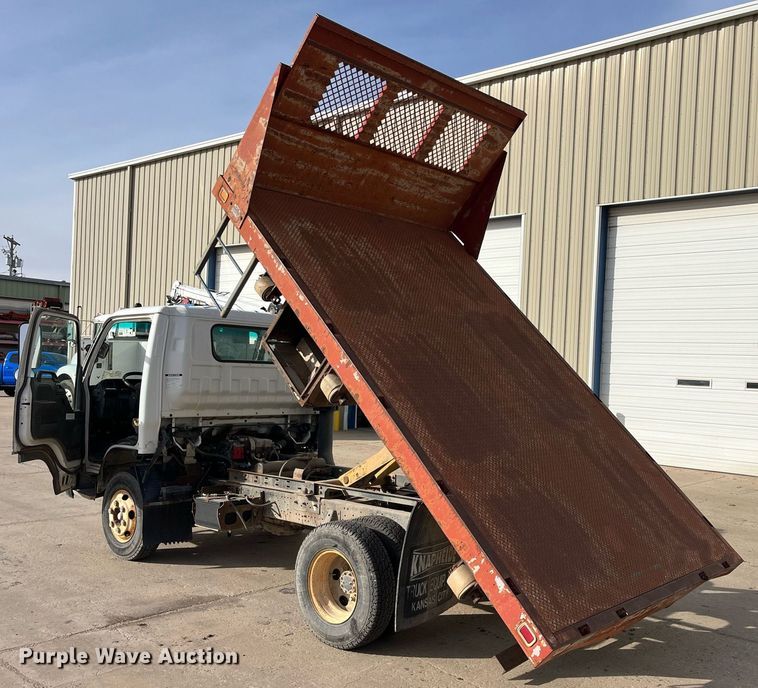 image for item DQ5119 1999 Isuzu NPR  dump flatbed truck