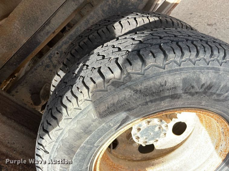 image for item DQ5119 1999 Isuzu NPR  dump flatbed truck