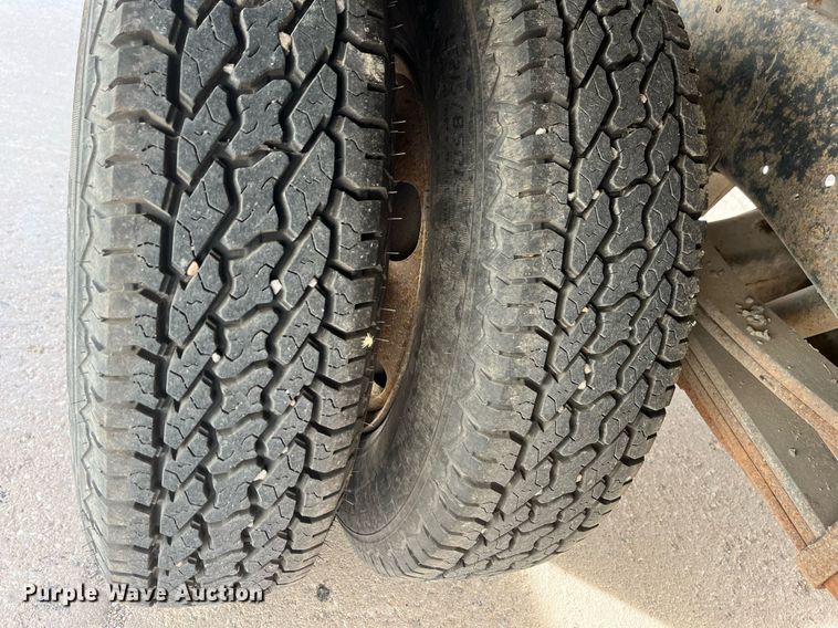 image for item DQ5119 1999 Isuzu NPR  dump flatbed truck