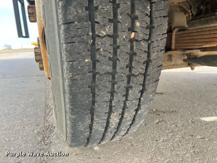 image for item DQ5119 1999 Isuzu NPR  dump flatbed truck