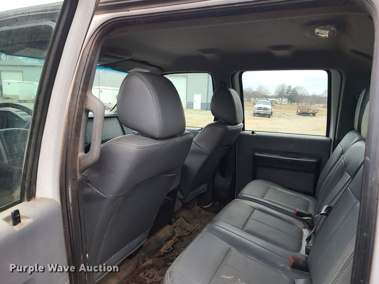 image for item JW9772 2013 Ford F350 Super Duty  Crew Cab flatbed pickup truck