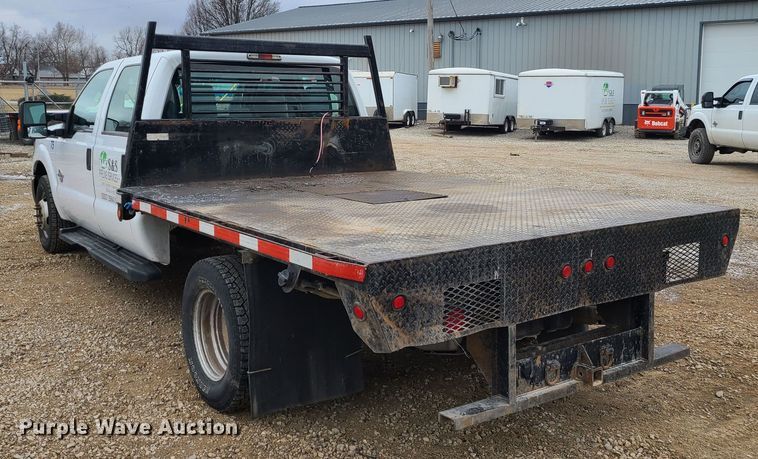 image for item JW9773 2014 Ford F350 Super Duty  Crew Cab flatbed pickup truck