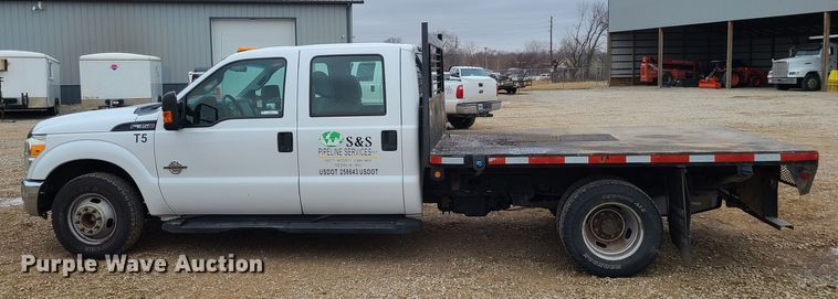 image for item JW9773 2014 Ford F350 Super Duty  Crew Cab flatbed pickup truck