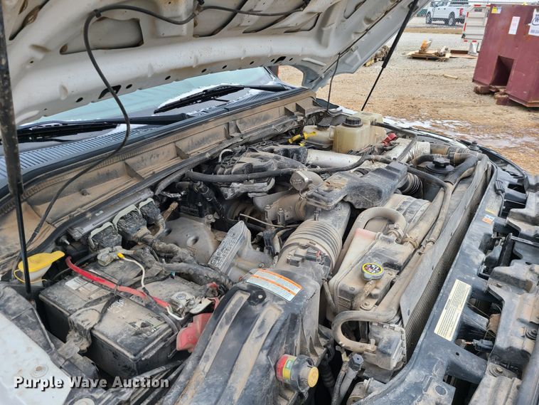 image for item JW9773 2014 Ford F350 Super Duty  Crew Cab flatbed pickup truck