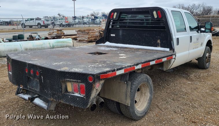 image for item JW9775 2012 Ford F350 Super Duty  Crew Cab flatbed pickup truck
