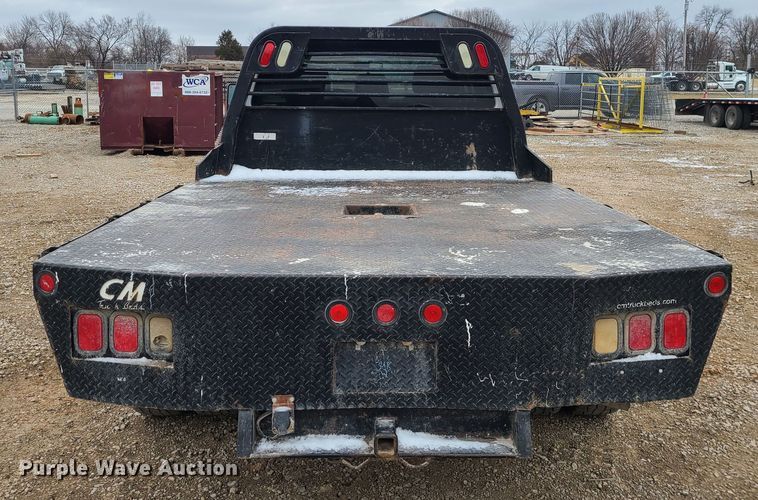 image for item JW9775 2012 Ford F350 Super Duty  Crew Cab flatbed pickup truck