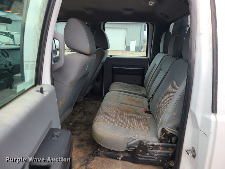 image for item JW9775 2012 Ford F350 Super Duty  Crew Cab flatbed pickup truck