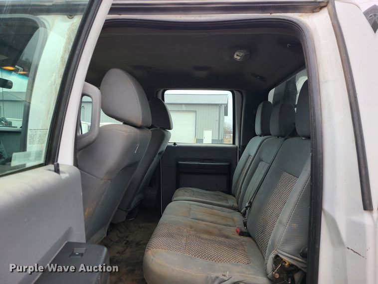 image for item JW9775 2012 Ford F350 Super Duty  Crew Cab flatbed pickup truck