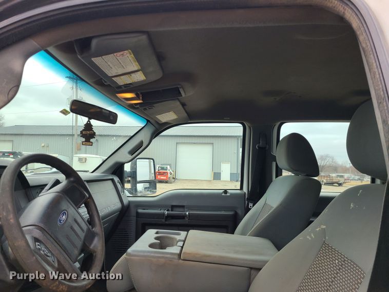 image for item JW9775 2012 Ford F350 Super Duty  Crew Cab flatbed pickup truck