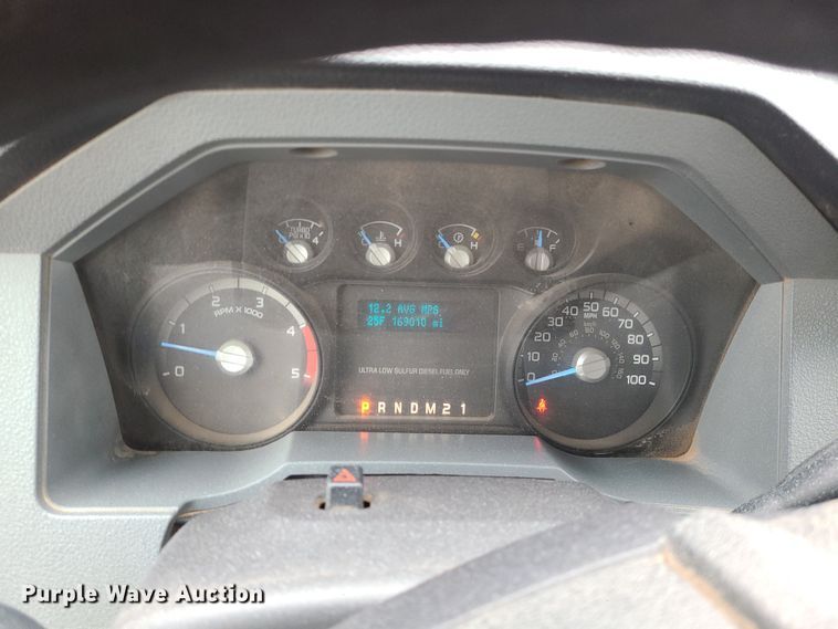 image for item JW9775 2012 Ford F350 Super Duty  Crew Cab flatbed pickup truck