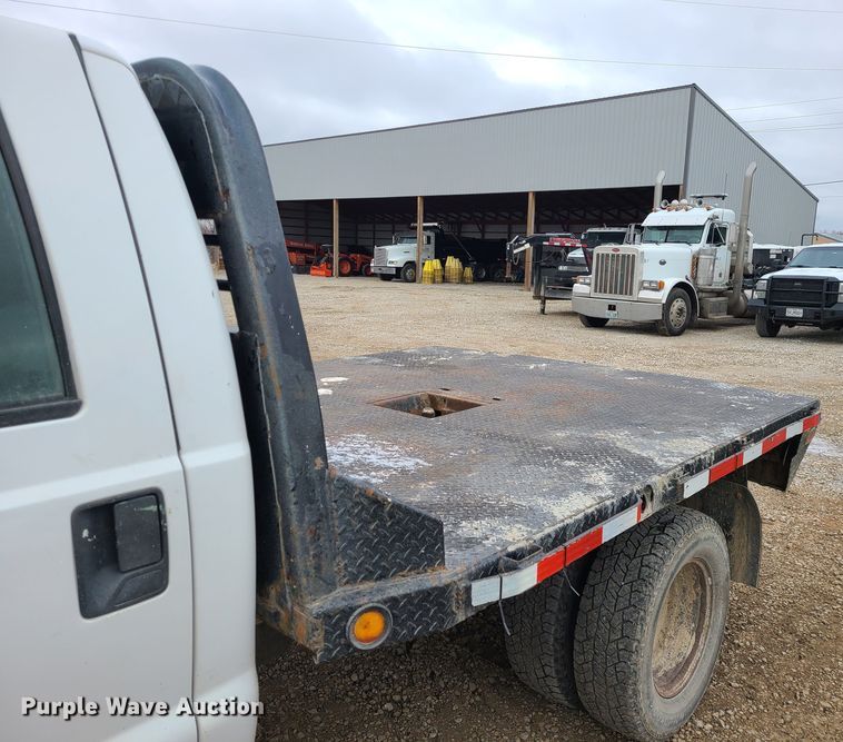 image for item JW9775 2012 Ford F350 Super Duty  Crew Cab flatbed pickup truck