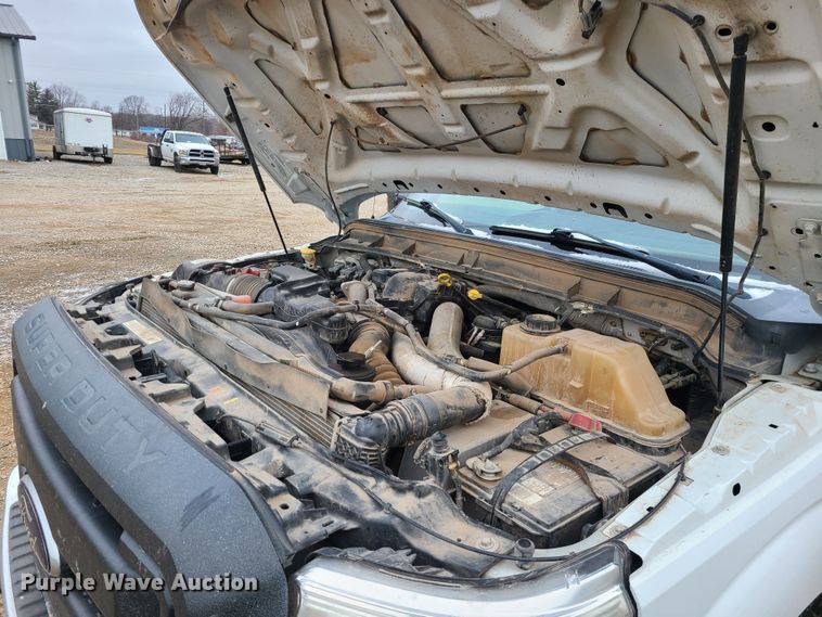 image for item JW9775 2012 Ford F350 Super Duty  Crew Cab flatbed pickup truck