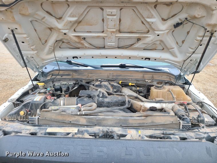 image for item JW9775 2012 Ford F350 Super Duty  Crew Cab flatbed pickup truck