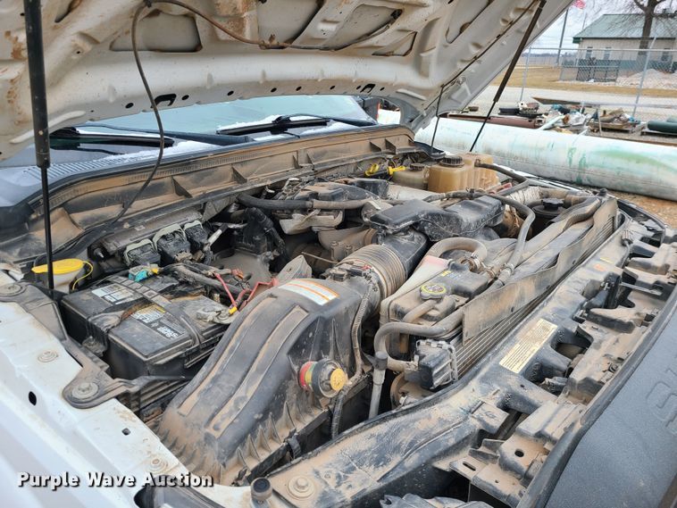 image for item JW9775 2012 Ford F350 Super Duty  Crew Cab flatbed pickup truck