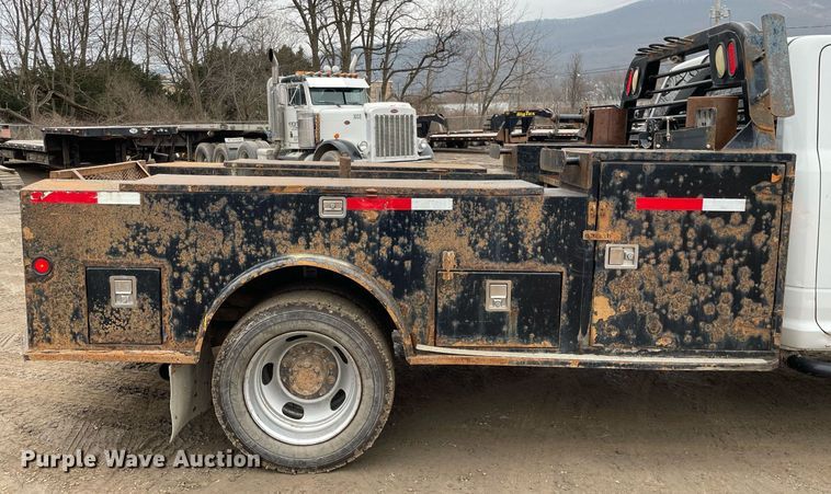 image for item MA9816 2012 Dodge Ram 5500HD  Crew Cab flatbed truck