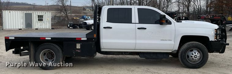 image for item MA9823 2017 Chevrolet Silverado 3500HD  Crew Cab flatbed pickup truck