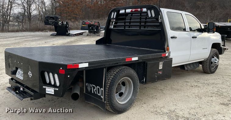 image for item MA9823 2017 Chevrolet Silverado 3500HD  Crew Cab flatbed pickup truck