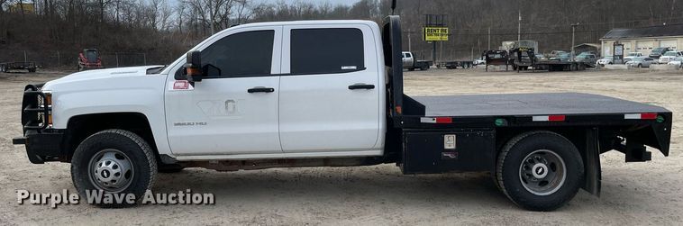 image for item MA9823 2017 Chevrolet Silverado 3500HD  Crew Cab flatbed pickup truck