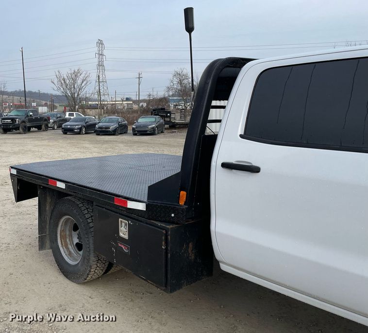 image for item MA9823 2017 Chevrolet Silverado 3500HD  Crew Cab flatbed pickup truck