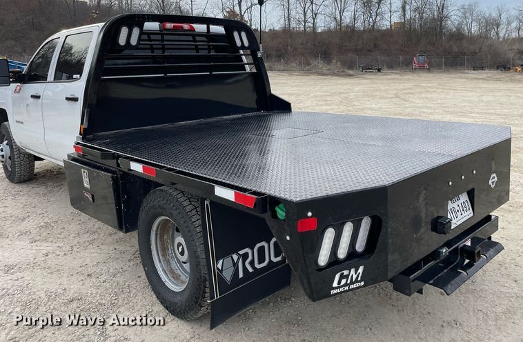 image for item MA9823 2017 Chevrolet Silverado 3500HD  Crew Cab flatbed pickup truck