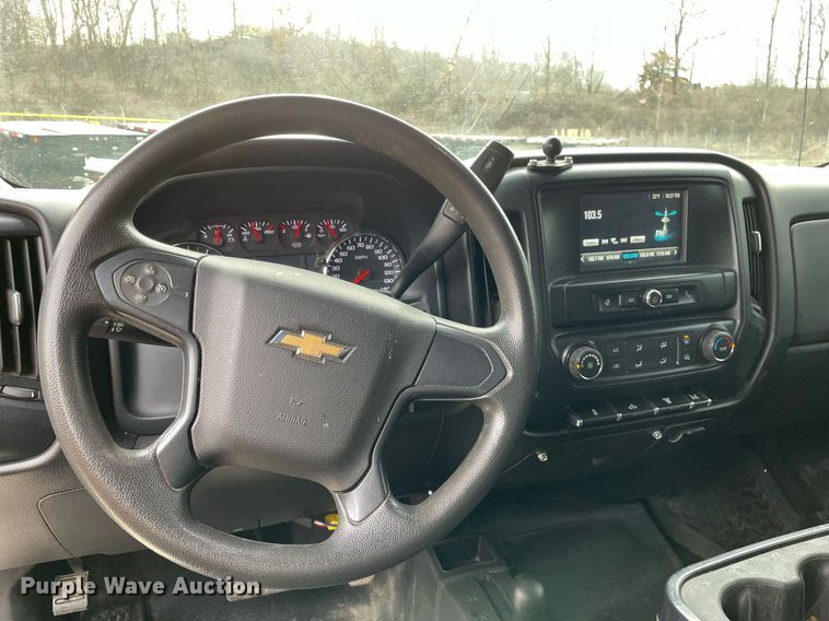 image for item MA9823 2017 Chevrolet Silverado 3500HD  Crew Cab flatbed pickup truck