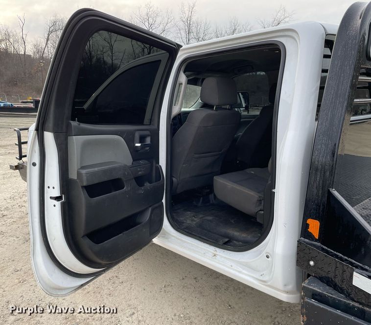 image for item MA9823 2017 Chevrolet Silverado 3500HD  Crew Cab flatbed pickup truck