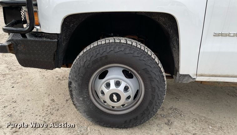 image for item MA9823 2017 Chevrolet Silverado 3500HD  Crew Cab flatbed pickup truck