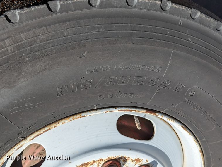 image for item LK9475 2002 Sterling L-Line  flatbed truck