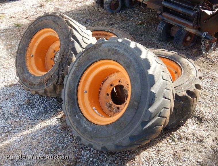 image for item JK9169 (4) Galaxy 33x15.50-16.5 skid steer tires and wheels