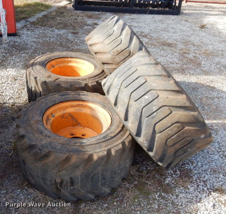 image for item JK9169 (4) Galaxy 33x15.50-16.5 skid steer tires and wheels