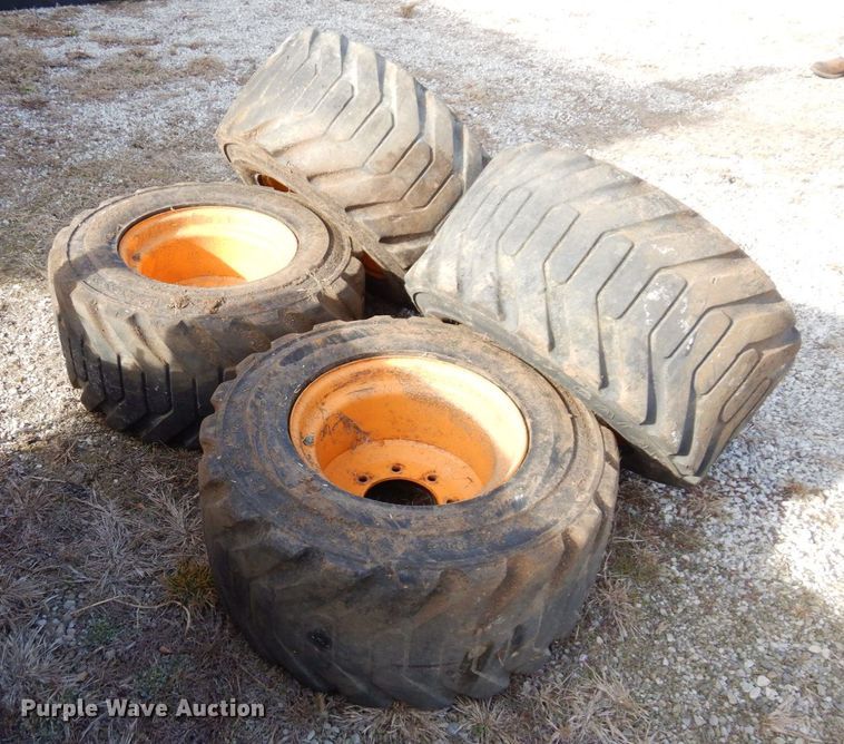 image for item JK9169 (4) Galaxy 33x15.50-16.5 skid steer tires and wheels