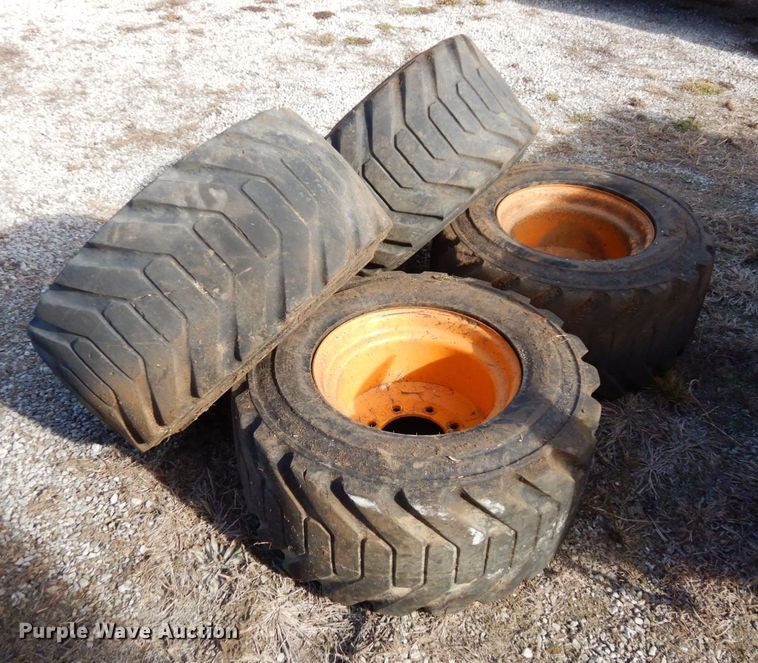 image for item JK9169 (4) Galaxy 33x15.50-16.5 skid steer tires and wheels