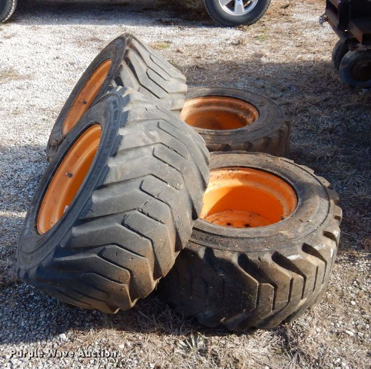 image for item JK9169 (4) Galaxy 33x15.50-16.5 skid steer tires and wheels