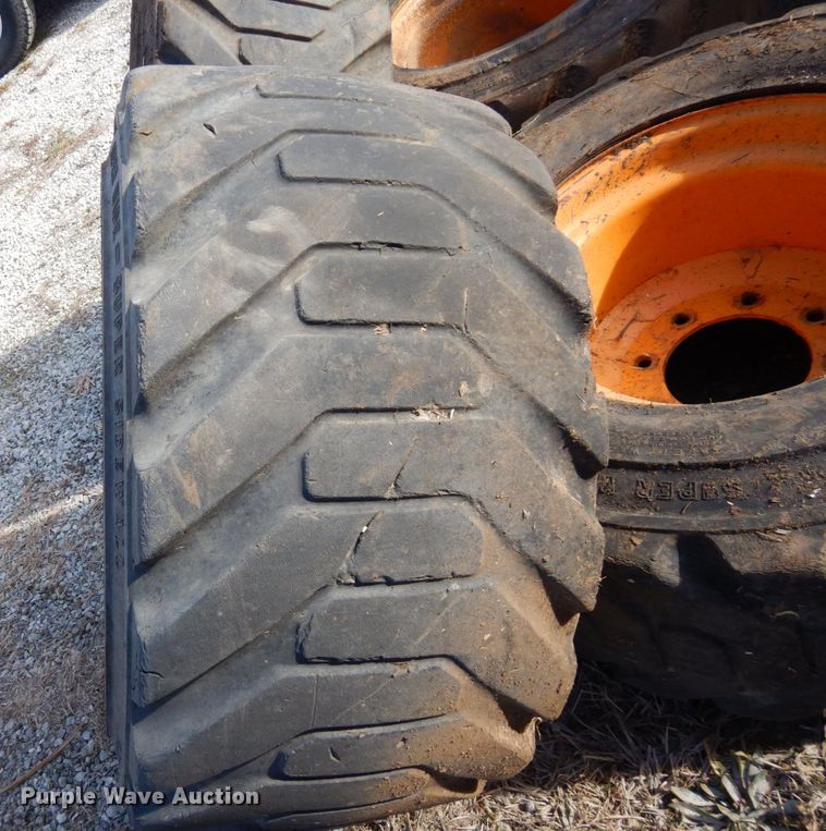 image for item JK9169 (4) Galaxy 33x15.50-16.5 skid steer tires and wheels