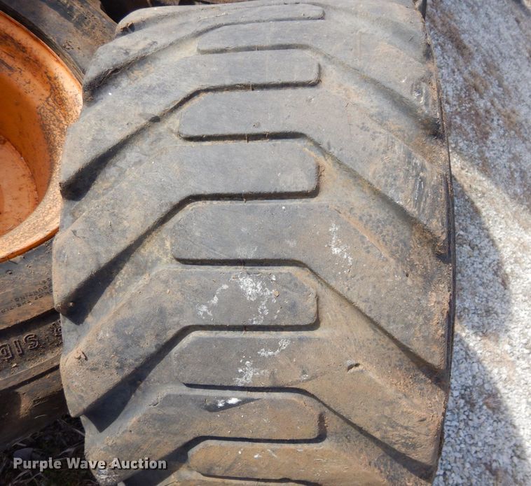 image for item JK9169 (4) Galaxy 33x15.50-16.5 skid steer tires and wheels