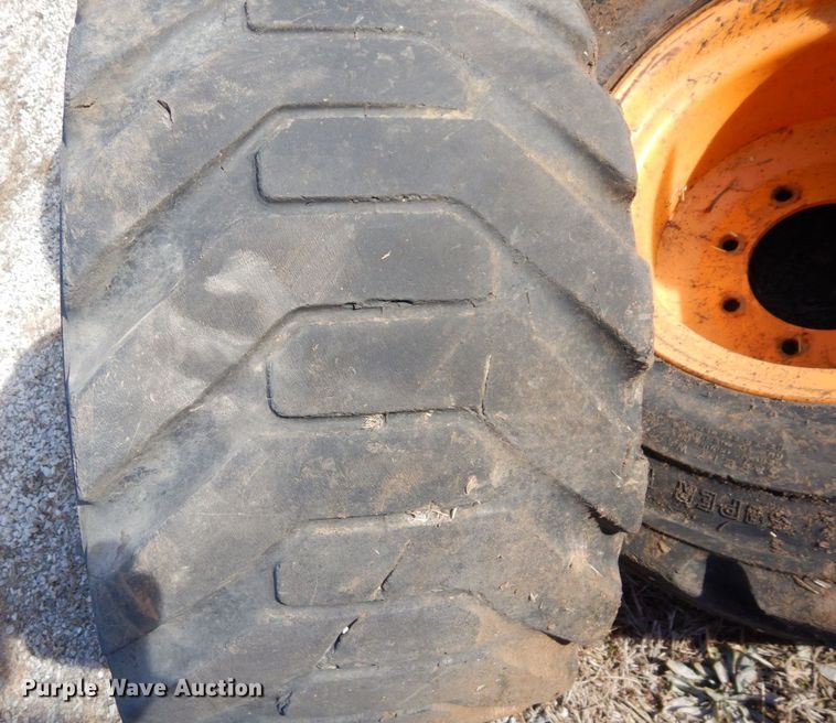 image for item JK9169 (4) Galaxy 33x15.50-16.5 skid steer tires and wheels