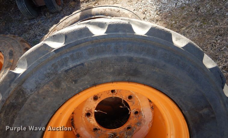 image for item JK9169 (4) Galaxy 33x15.50-16.5 skid steer tires and wheels